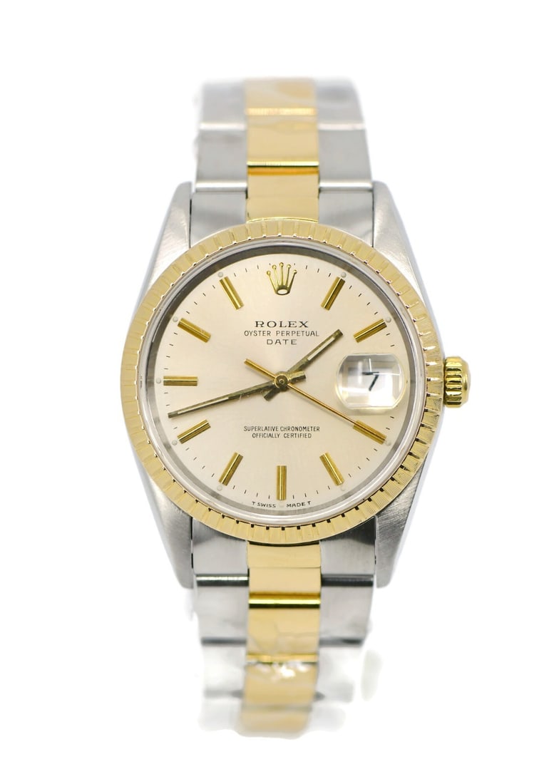 Men's 34mm Oyster Perpetual Date Wristwatch Ref 15223 in 18K and Steel: Men's 34mm Oyster Perpetual Date Wristwatch Ref 15223 in 18K and Steel This is a pre-owned Rolex Oyster Perpetual Date wristwatch, reference 15223, featuring a 34 mm stainless steel case with 18K gold