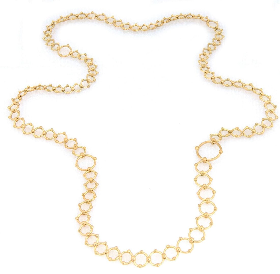 31 Inch 18K Yellow Gold Ring Bead Link Necklace by Tiffany & Co.: 31 Inch 18K Yellow Gold Ring Bead Link Necklace by Tiffany & Co. This authentic Tiffany & Co. necklace is crafted from solid 18k yellow gold and features an assorted ring and bead link design with var