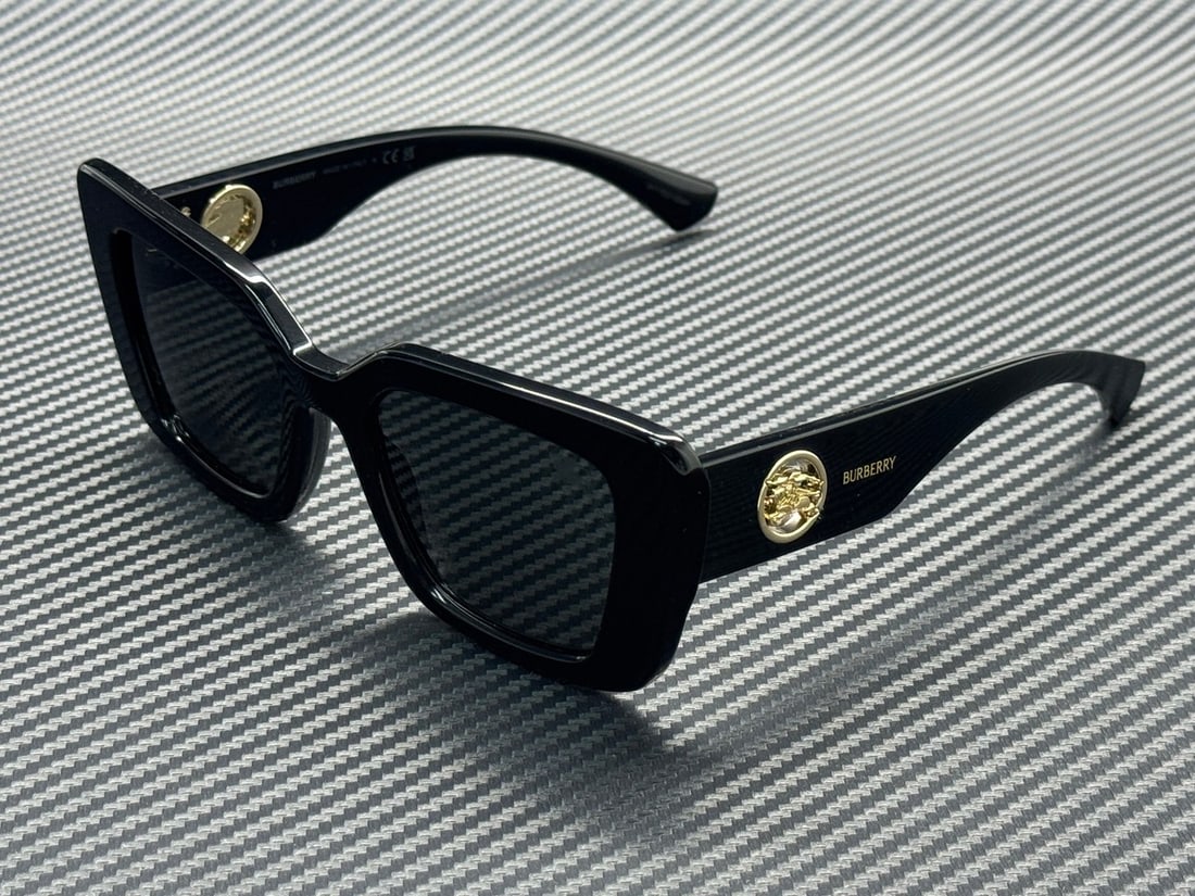 Burberry BE4476 300187 Women's Black 51mm Dark Grey Lens Sunglasses Set: Burberry BE4476 300187 Women's Black 51mm Dark Grey Lens Sunglasses Set These Burberry BE4476 300187 sunglasses feature a classic black frame paired with dark grey lenses, designed for women. The sung