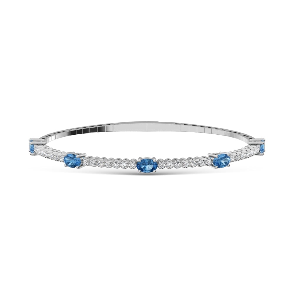 14K White Gold 3 5/8 Ct.Tw. white and Oval Shape Blue Lab Grown Diamond Bangle: 14K White Gold 3 5/8 Ct.Tw. white and Oval Shape Blue Lab Grown Diamond Bangle Crafted in 14K White Gold, this bangle features white and oval-shaped blue lab grown diamonds totaling 3 5/8 Ct.Tw., deli