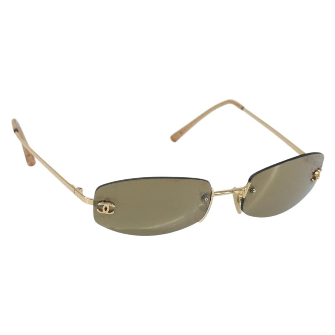 Gold Tone Metal Chanel Coco Mark Sunglasses with Case for Women: Gold Tone Metal Chanel Coco Mark Sunglasses with Case for Women These CHANEL COCO Mark sunglasses feature a gold tone metal frame and iconic CC design. Crafted in Italy, they are designed for women an