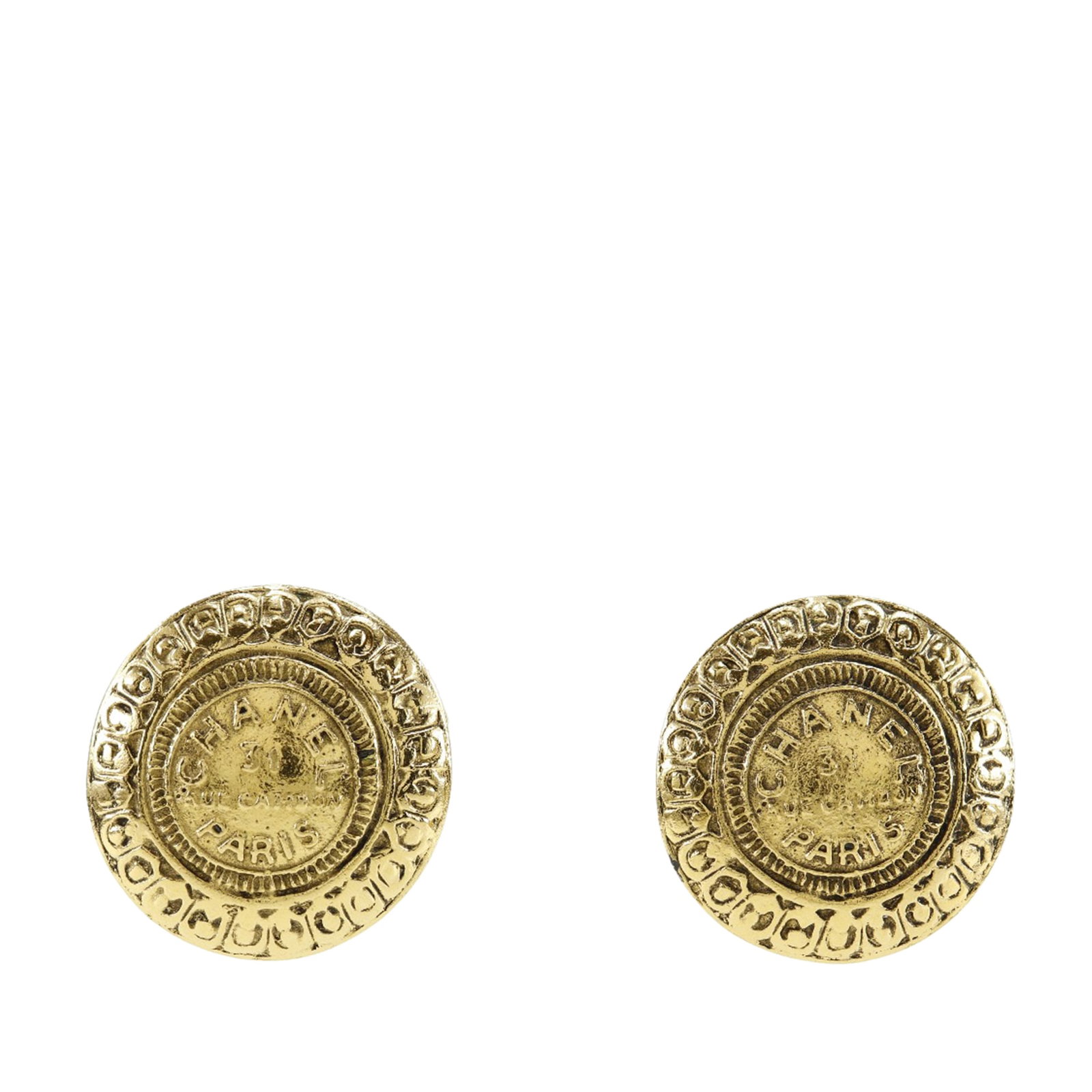 Chanel Rue Cambon Gold Plated Clip Earrings: Chanel Rue Cambon Gold Plated Clip Earrings These Chanel clip-on earrings feature gold plated metal bodies with a medallion design inspired by Rue Cambon. Made in France, they offer a classic gold-ton