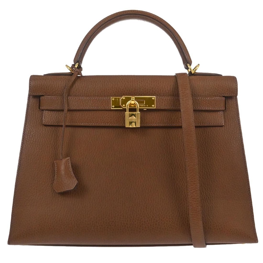 Hermes Kelly 32 Noisette Ardennes Leather Sellier Two Way Top Handle Bag: Hermes Kelly 32 Noisette Ardennes Leather Sellier Two Way Top Handle Bag This Hermes Kelly 32 Sellier 2-way handbag features a Noisette-colored Ardennes leather exterior with gold-tone hardware. The m