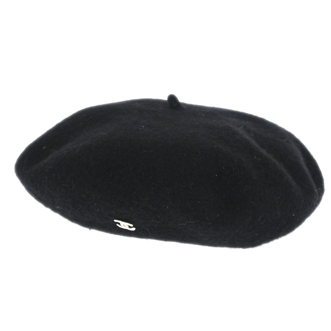 Black Beret with Logo Accent by Chanel in Small Size: Black Beret with Logo Accent by Chanel in Small Size This vintage Chanel beret features a classic black color and logo accent, offering a timeless accessory for casual occasions. Suitable for fall and