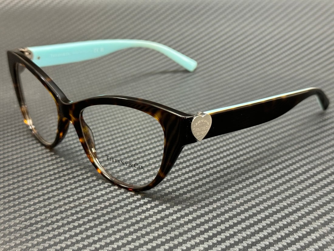 Tiffany & Co. TF2251 8363 Havana 53mm Women's Eyeglasses with Authenticity Certificate: Tiffany & Co. TF2251 8363 Havana 53mm Women's Eyeglasses with Authenticity Certificate Explore the elegance of Tiffany & Co. with these stylish TF2251 8363 Havana Women's eyeglasses. Crafted from high