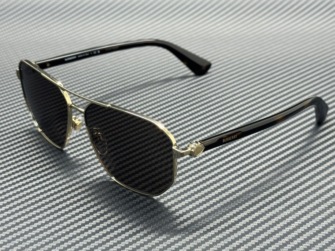 Men's Burberry BE3166 Light Gold 60mm Sunglasses With Case and Accessories: Men's Burberry BE3166 Light Gold 60mm Sunglasses With Case and Accessories These Burberry BE3166 110973 men's sunglasses feature a light gold frame with dark brown lenses. The sunglasses come with the