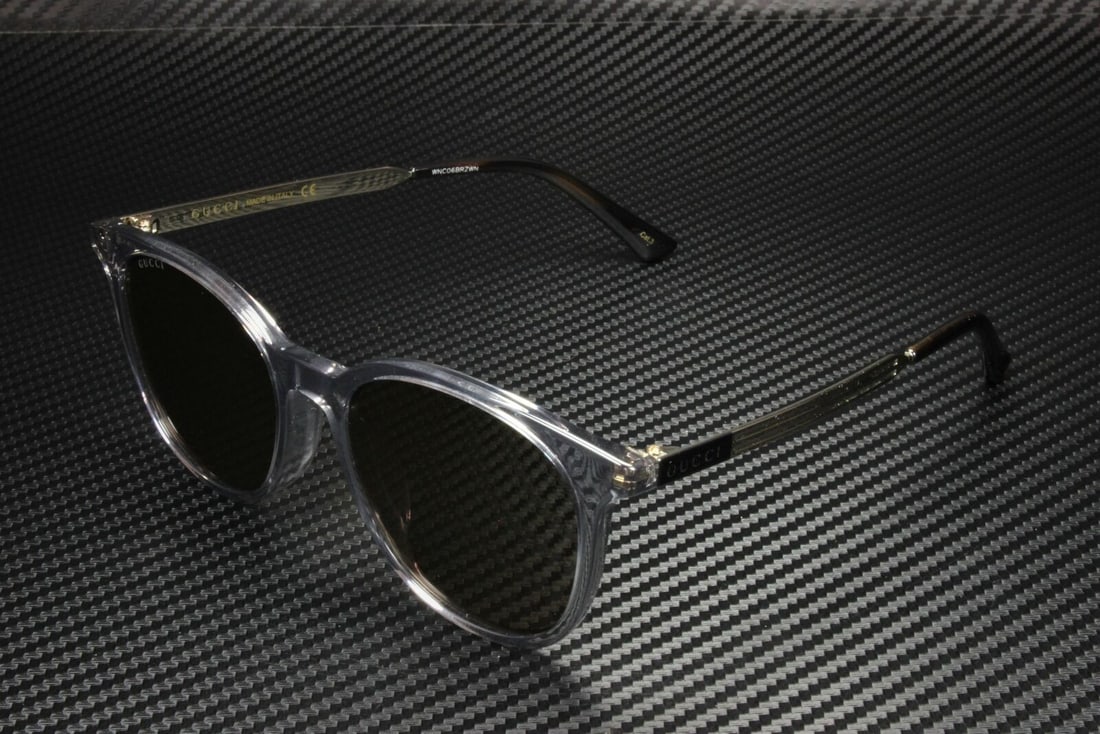 GUCCI GG0830SK 004 Grey Transparent Round Sunglasses with Brown Lenses: GUCCI GG0830SK 004 Grey Transparent Round Sunglasses with Brown Lenses Elevate your eyewear collection with these GUCCI GG0830SK 004 sunglasses designed for men. Featuring a stylish round frame in a s