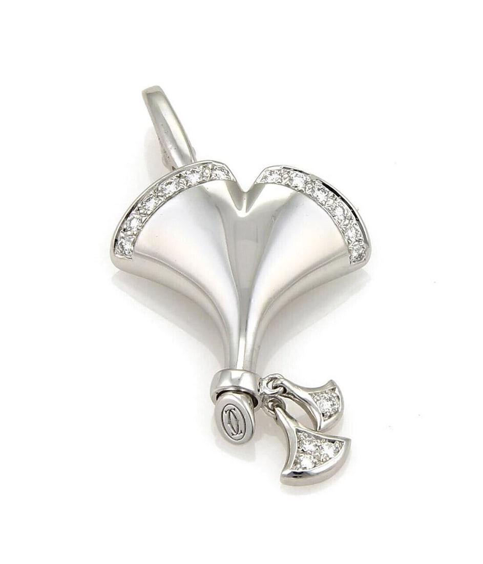 18k White Gold Ginkgo Leaf Pendant with Diamonds by Cartier: 18k White Gold Ginkgo Leaf Pendant with Diamonds by Cartier This Cartier Ginkgo pendant features a delicate leaf design crafted in 18k white gold and is adorned with sparkling diamonds totaling 0.25 c