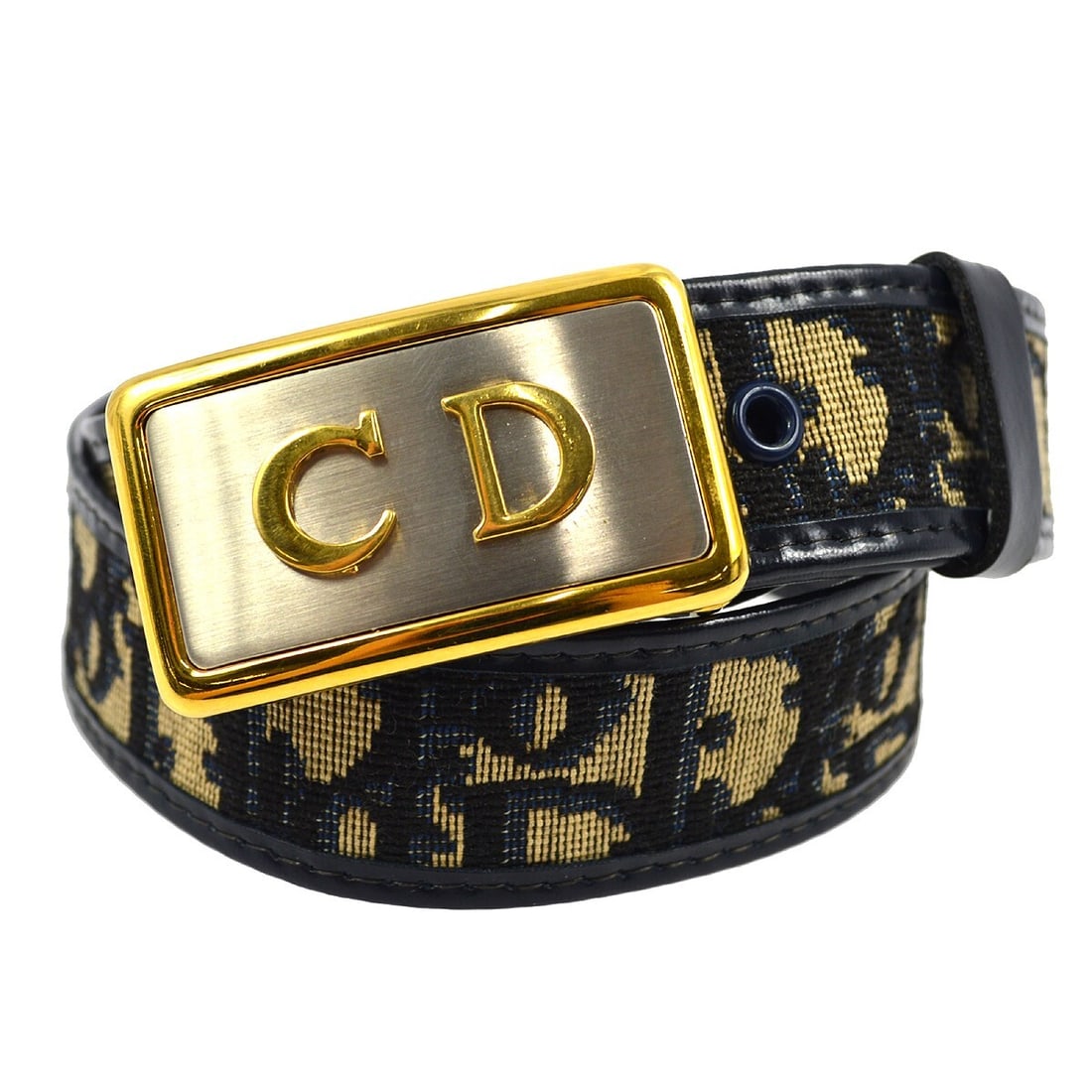 Christian Dior Trotter Canvas Belt in Navy and Brown Size 65 Small: Christian Dior Trotter Canvas Belt in Navy and Brown Size 65 Small This vintage Christian Dior belt features the signature Trotter pattern in navy and brown canvas. The belt is size 65 and crafted in