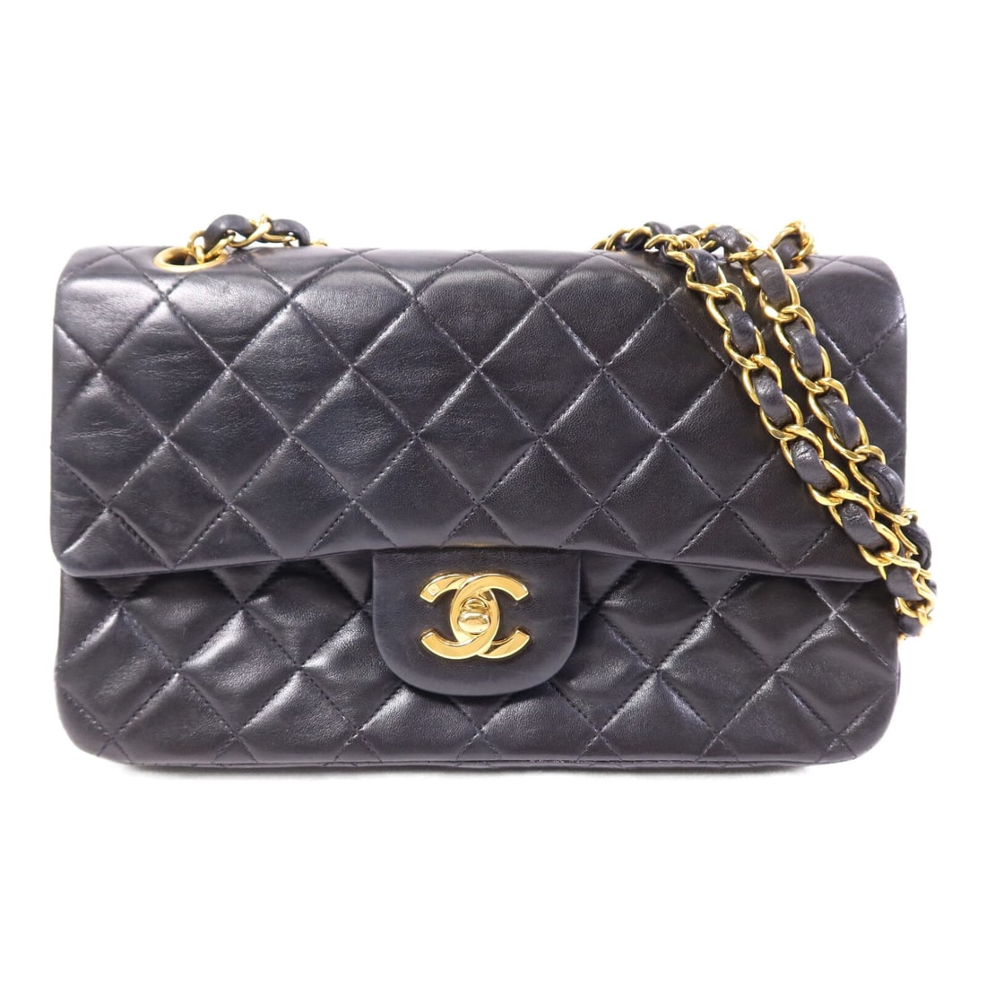 Chanel Classic 23 Black Lambskin Shoulder Bag with Gold Tone Chain: Chanel Classic 23 Black Lambskin Shoulder Bag with Gold Tone Chain This CHANEL CC Classic 23 chain shoulder bag features luxurious black lambskin leather with a signature CC design. Designed for women