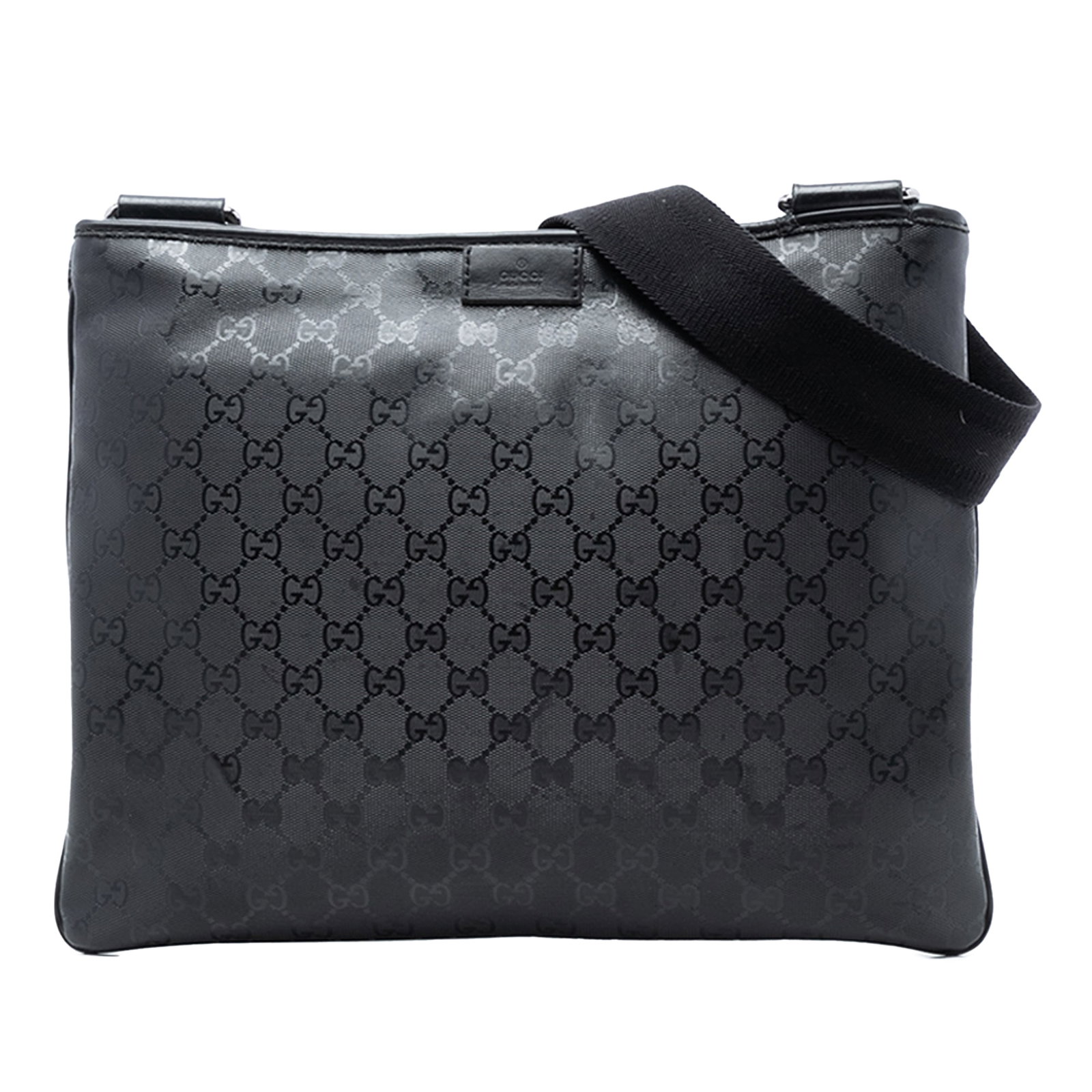 Black GG Imprime Coated Canvas Crossbody Bag with Leather Trim by Gucci: Black GG Imprime Coated Canvas Crossbody Bag with Leather Trim by Gucci This Gucci GG Imprime Crossbody bag features a coated canvas exterior with leather trim, an adjustable flat strap, a top zip clo