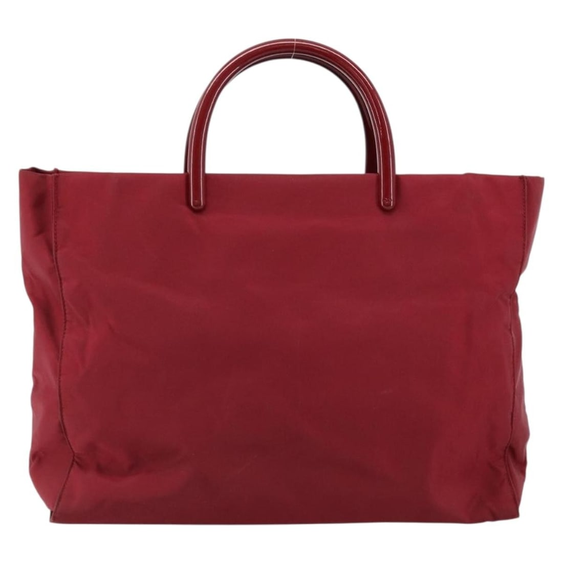 Red Nylon Vintage Prada Tote Bag 33cm x 25cm x 12cm Italy: Red Nylon Vintage Prada Tote Bag 33cm x 25cm x 12cm Italy This Prada vintage tote is crafted from red nylon and features a spacious interior, ideal for everyday use. Designed for women, the bag shows 