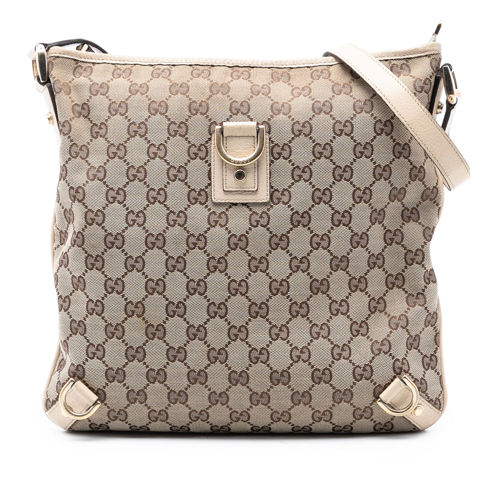 Brown Gucci Abbey Canvas Crossbody Bag with D Ring Detail: Brown Gucci Abbey Canvas Crossbody Bag with D Ring Detail The Gucci GG Canvas Abbey D Ring Crossbody features a brown canvas body with leather trim and an adjustable flat leather strap. It is designed