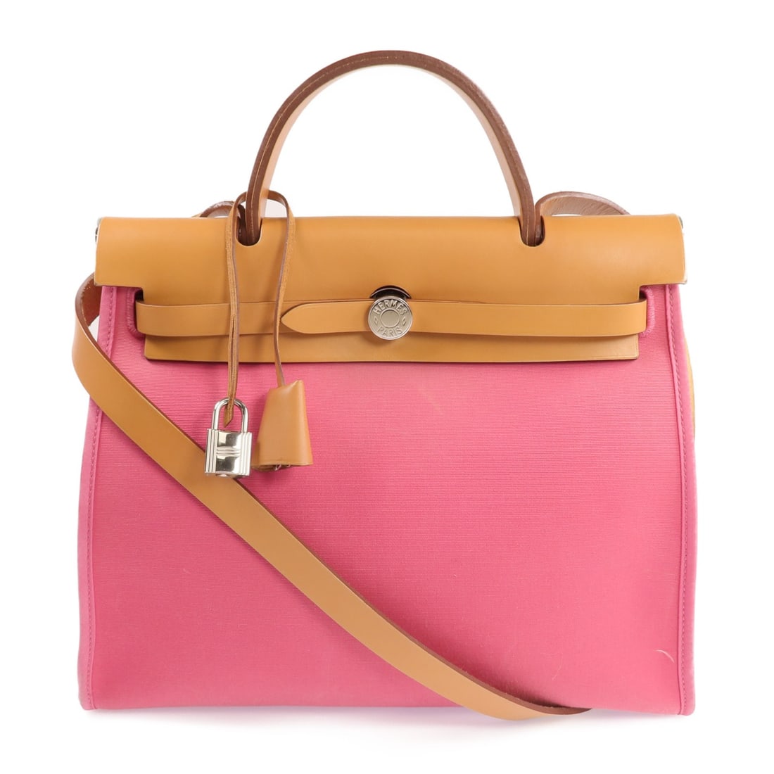 Herbag PM Pink Canvas 2 Way Shoulder Bag by Hermes with Palladium Hardware: Herbag PM Pink Canvas 2 Way Shoulder Bag by Hermes with Palladium Hardware This Hermes Herbag PM is a versatile 2-way shoulder handbag crafted from pink canvas. Featuring polished palladium hardware (