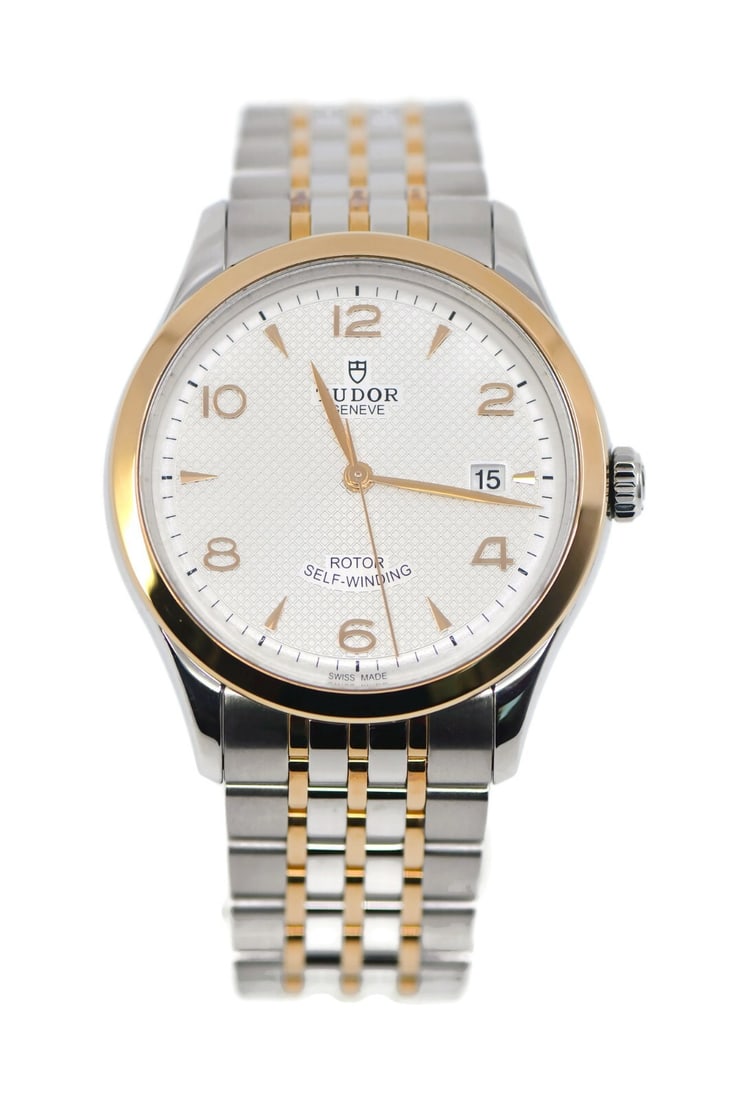 Tudor 1926 18K Gold Stainless Steel Automatic Watch 39mm with Box and Papers: Tudor 1926 18K Gold Stainless Steel Automatic Watch 39mm with Box and Papers This Tudor 1926 wristwatch combines elegance and functionality with its mechanical automatic movement. Crafted from both 18