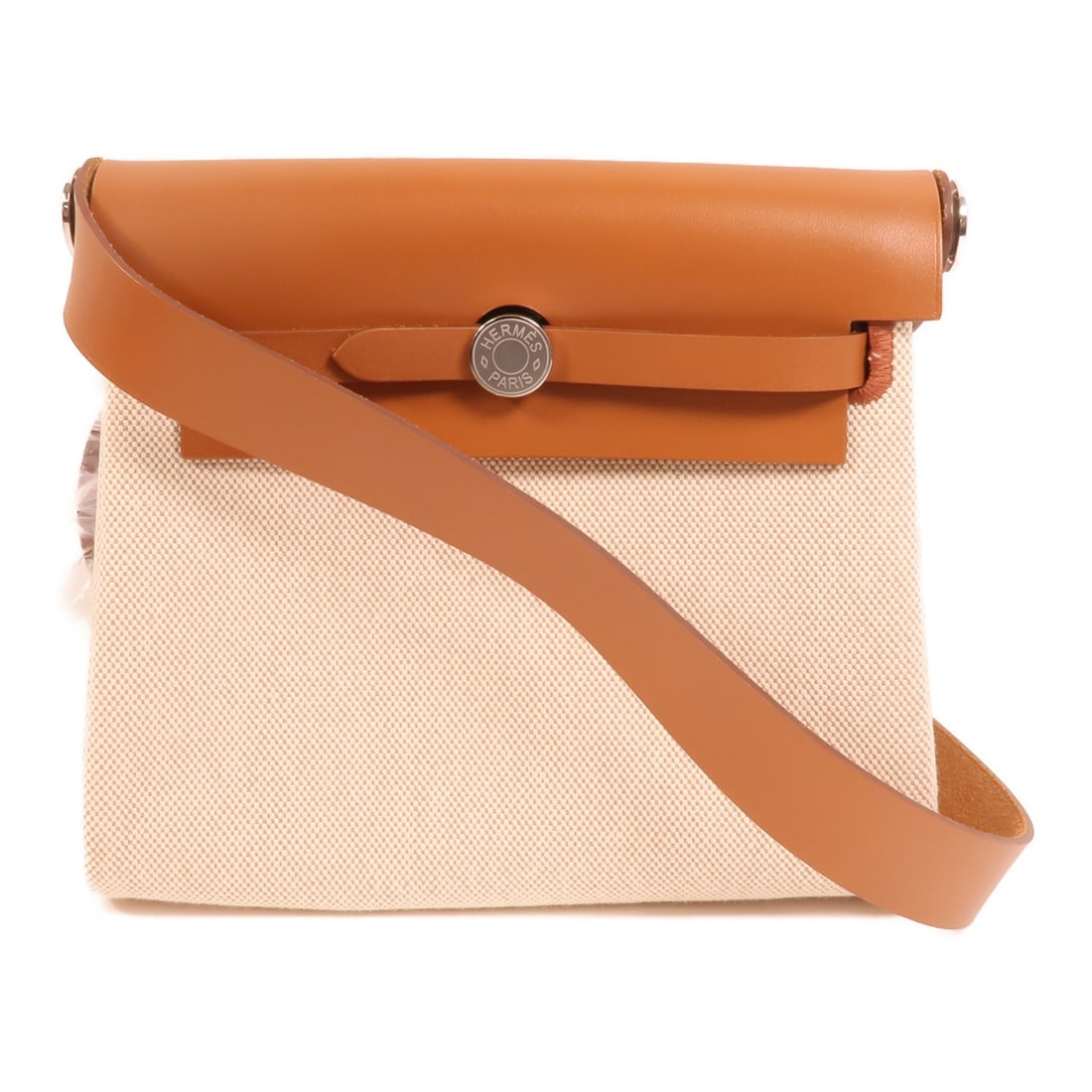 Hermes Mini Herbag Beige Canvas Shoulder Bag with Palladium Hardware: Hermes Mini Herbag Beige Canvas Shoulder Bag with Palladium Hardware This Hermes Mini Herbag shoulder bag features a beige canvas exterior with Fauve accents. Designed for women, it offers a compact a