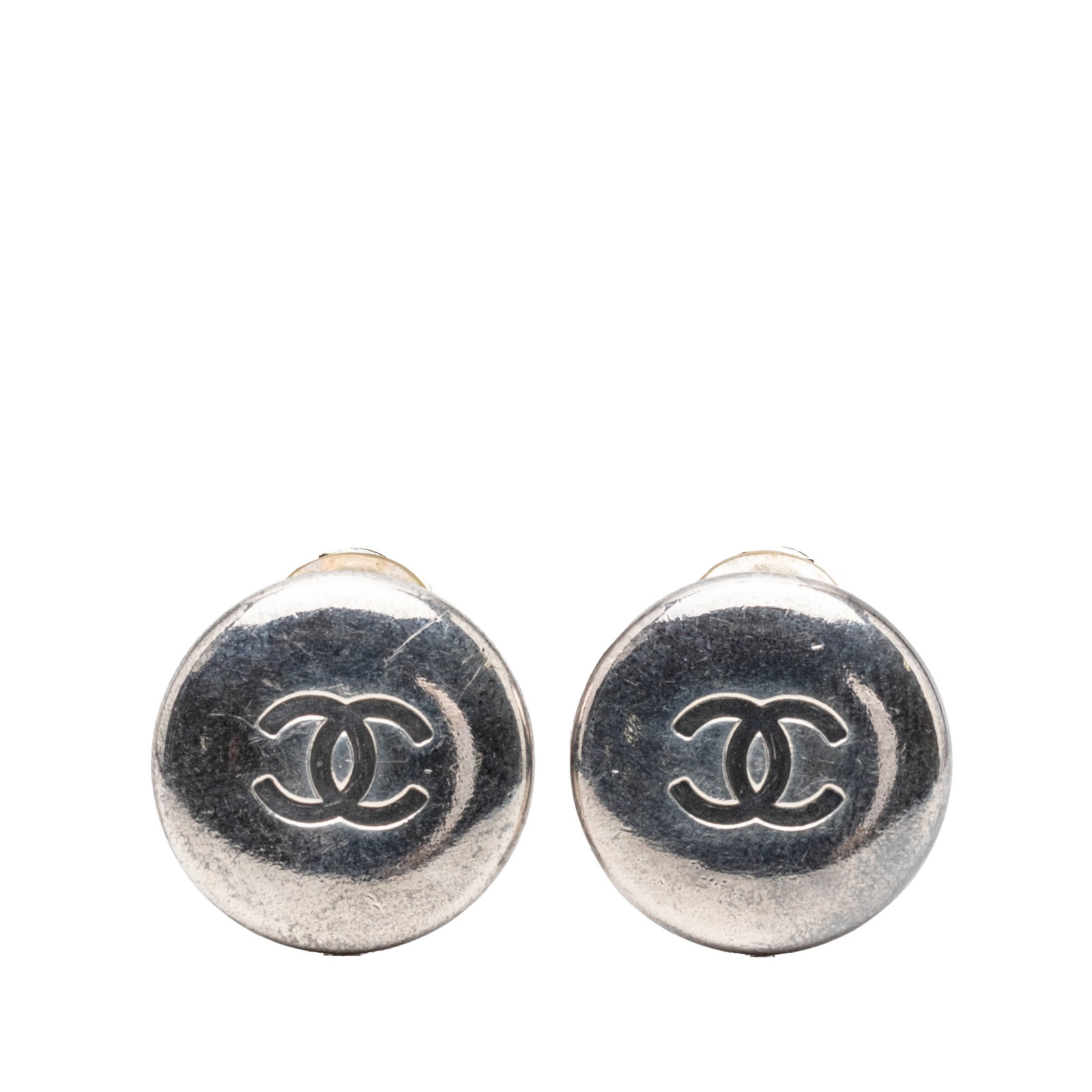 Chanel Round Clip Earrings Silver Plated CC Logo: Chanel Round Clip Earrings Silver Plated CC Logo These Chanel earrings feature a round design crafted from silver plated metal with clip-on closures. Made in France, they are part of the costume jewel