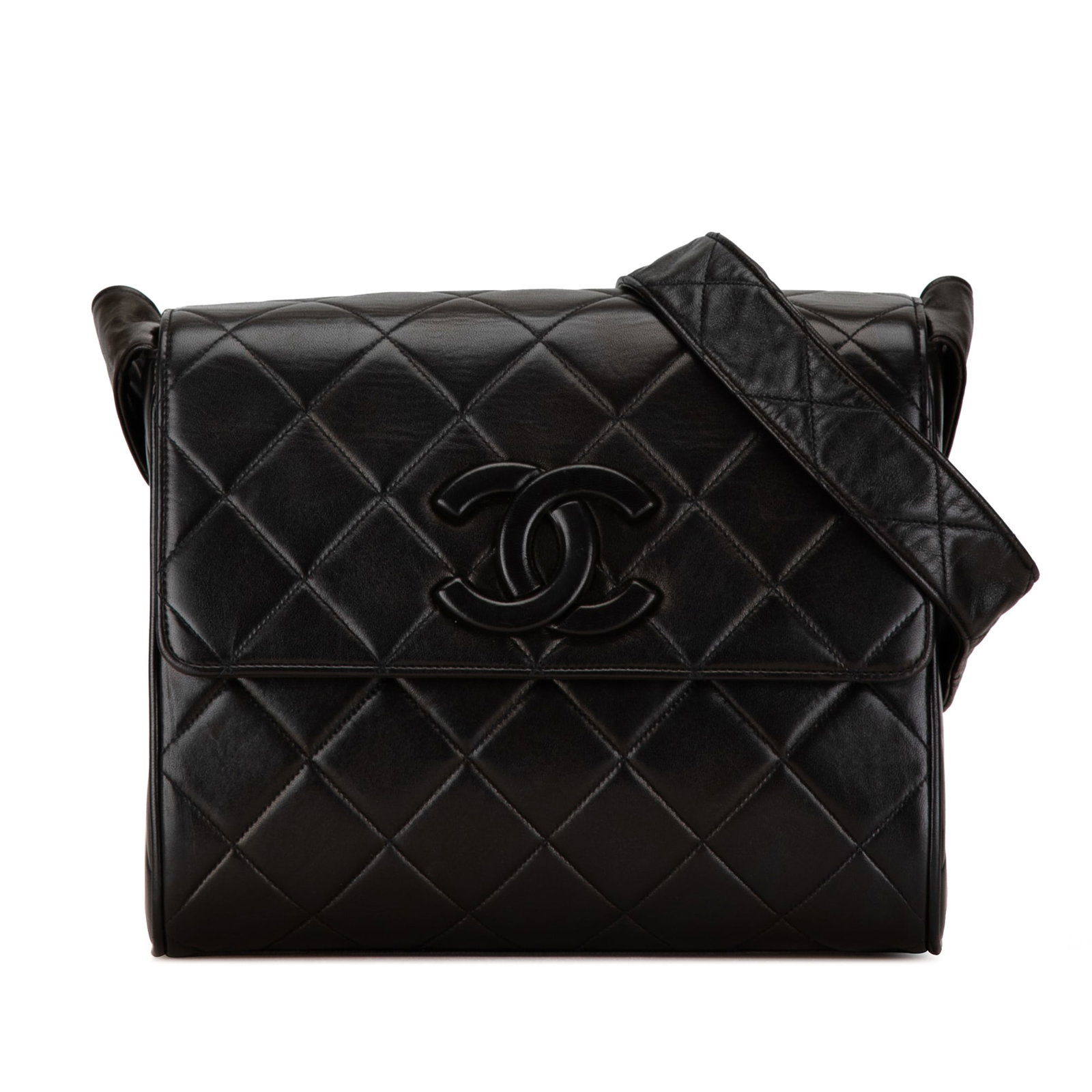 Chanel CC Quilted Flap Bag Black Lambskin Leather with Dust Bag: Chanel CC Quilted Flap Bag Black Lambskin Leather with Dust Bag This elegant Chanel CC Quilted Lambskin Flap crossbody bag is crafted from luxurious lambskin leather in a classic black hue. The bag fe