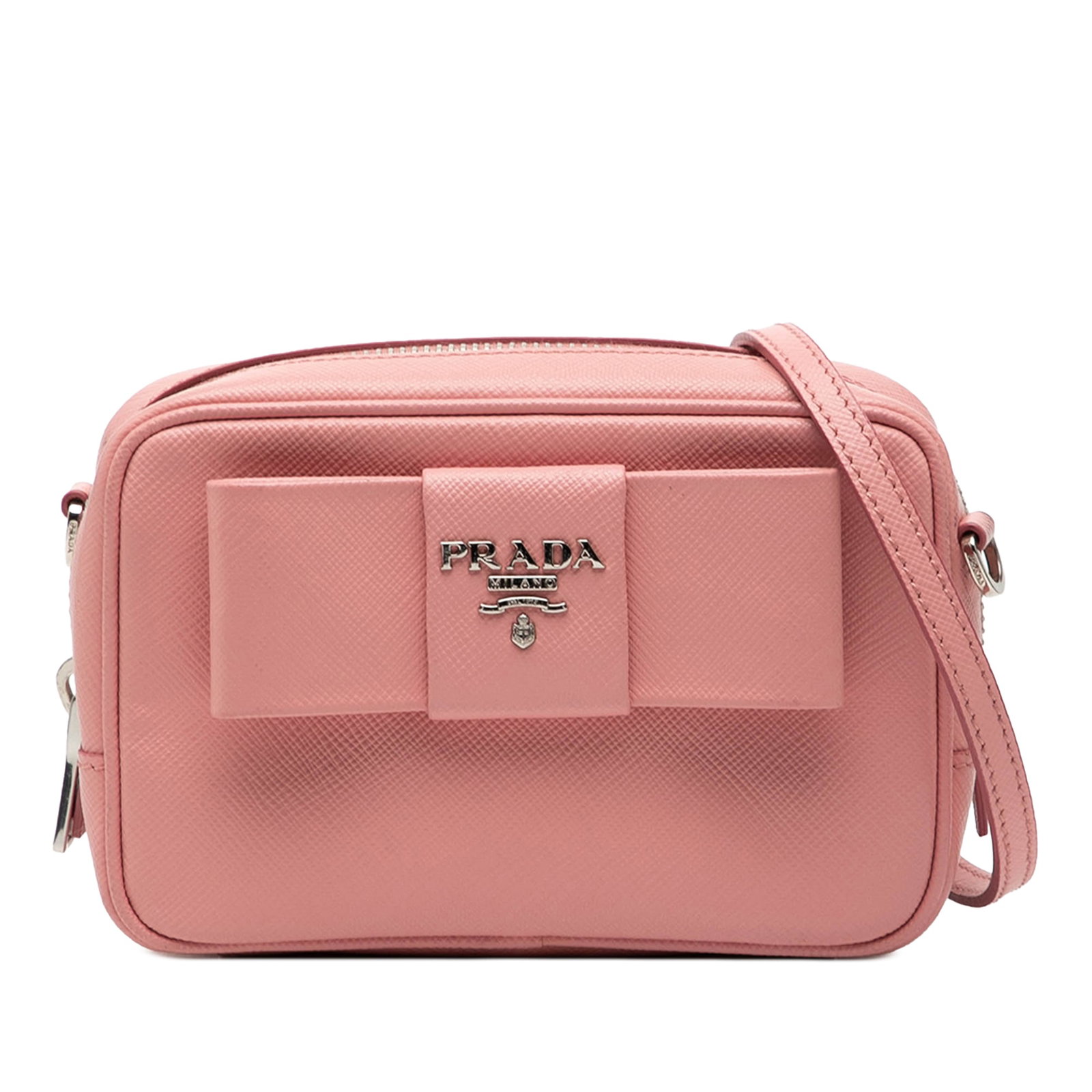 Pink Saffiano Leather Crossbody with Bow Detail by Prada: Pink Saffiano Leather Crossbody with Bow Detail by Prada This Prada Saffiano Fiocco Bow Camera Bag features a structured saffiano leather body in pink with a distinctive bow detail. It includes a deta