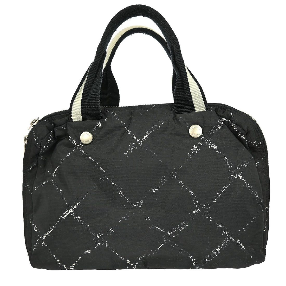 Chanel Black Nylon Travel Line Boston Handbag: Chanel Black Nylon Travel Line Boston Handbag This Chanel Travel Line Boston Bag features a printed black nylon exterior, designed specifically for women. Made in France, it offers both style and prac