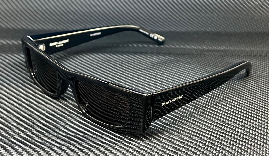 Saint Laurent SL 553 001 Black Grey Unisex Sunglasses 52mm: Saint Laurent SL 553 001 Black Grey Unisex Sunglasses 52mm Elevate your accessory game with these Saint Laurent SL 553 001 sunglasses, designed for a stylish unisex look. Featuring a sleek black frame