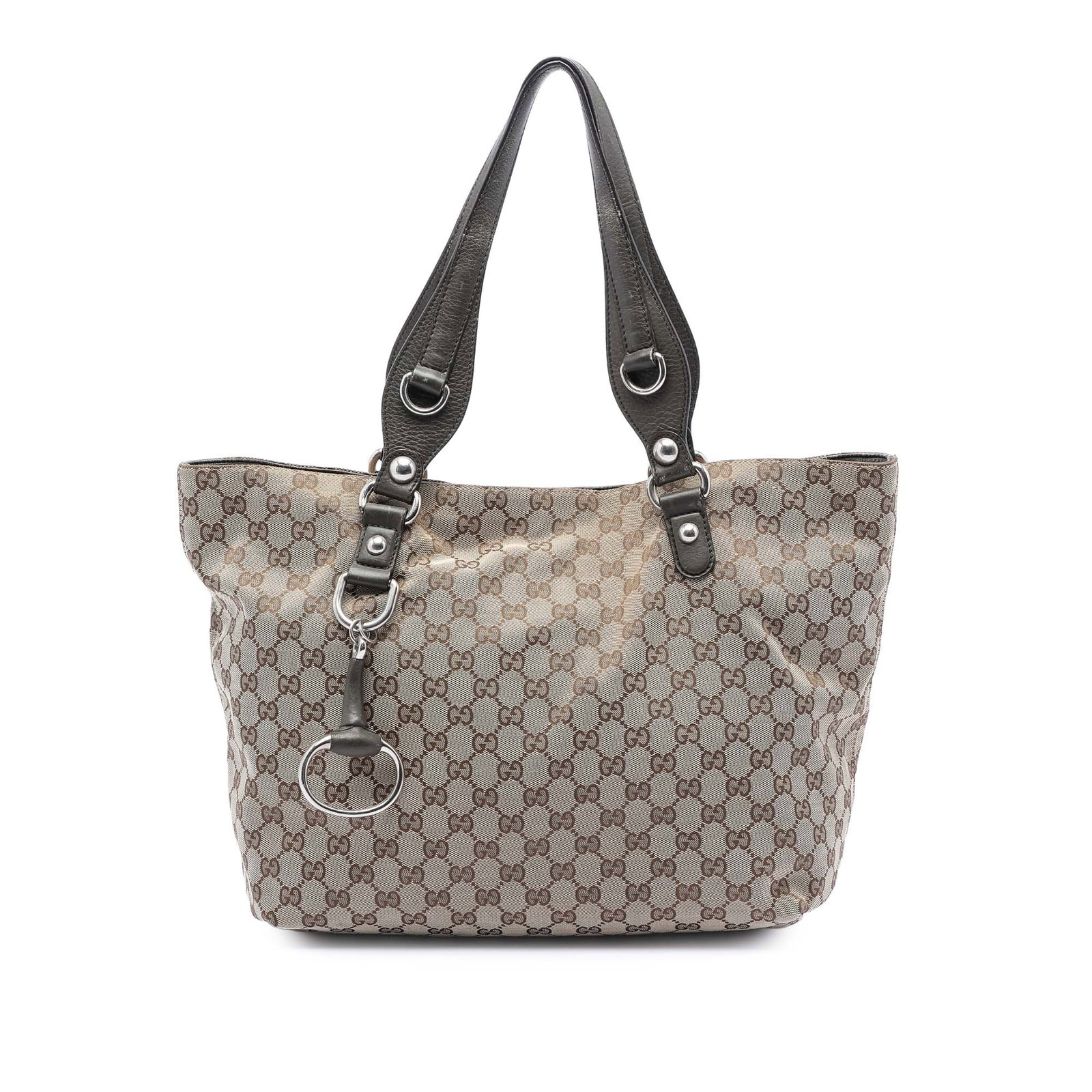 Medium GG Canvas Icon Bit Tote Bag by Gucci with Leather Trim: Medium GG Canvas Icon Bit Tote Bag by Gucci with Leather Trim This Gucci Medium GG Canvas Icon Bit Tote is crafted from canvas with leather trim and features flat leather straps. The bag has an open t