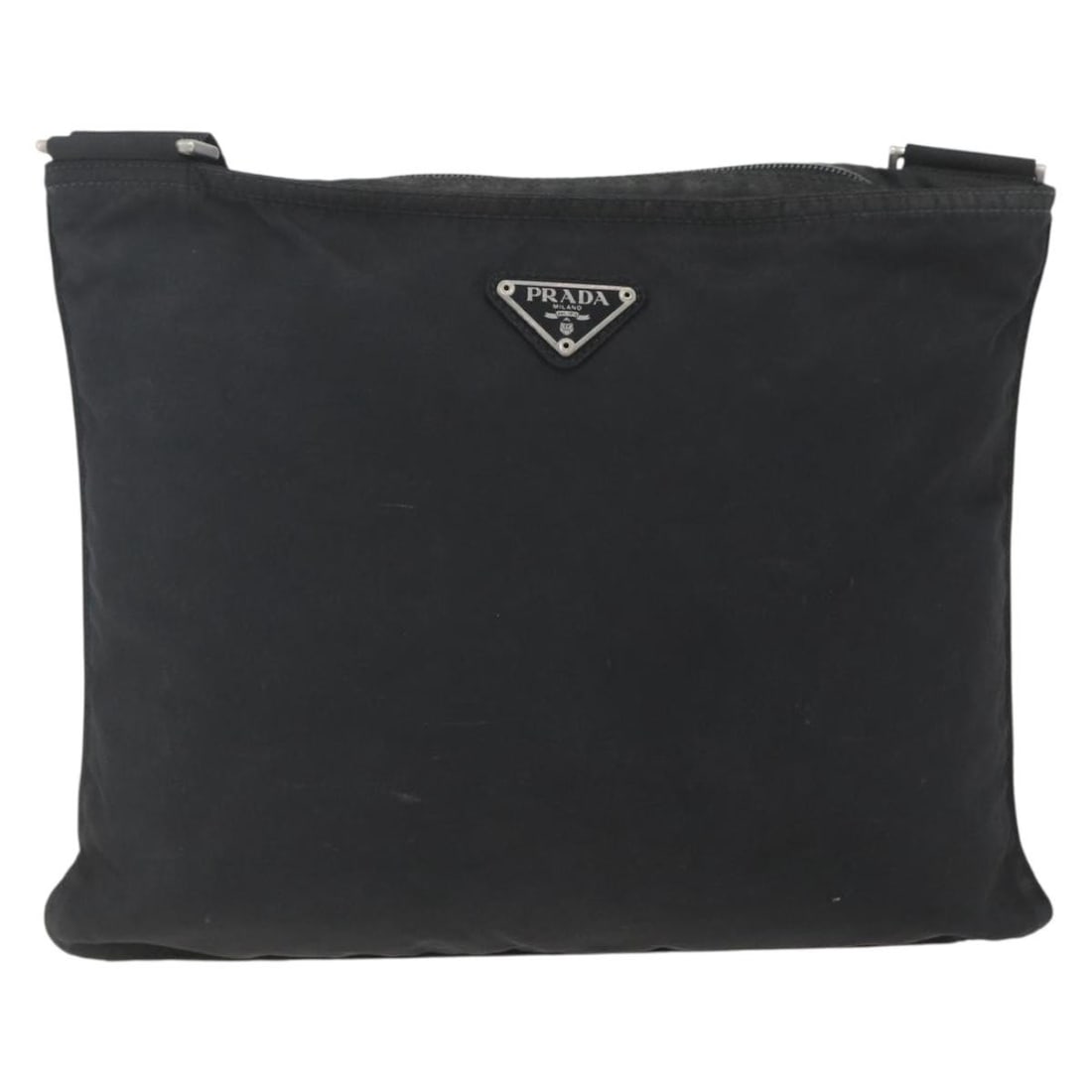 Black Nylon Prada Tessuto Unisex Zip Top Messenger Bag: Black Nylon Prada Tessuto Unisex Zip Top Messenger Bag This Prada Zip Top Messenger Bag is crafted from durable black nylon and designed for unisex use. It features a zip-top closure and a practical m