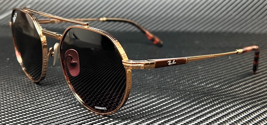 Ray-Ban RB8265 3140AF Rose Gold Polarized Sunglasses with Authenticity Certificate: Ray-Ban RB8265 3140AF Rose Gold Polarized Sunglasses with Authenticity Certificate Elevate your eyewear collection with these Ray-Ban RB8265 3140AF sunglasses. Featuring a stylish rose gold frame comp