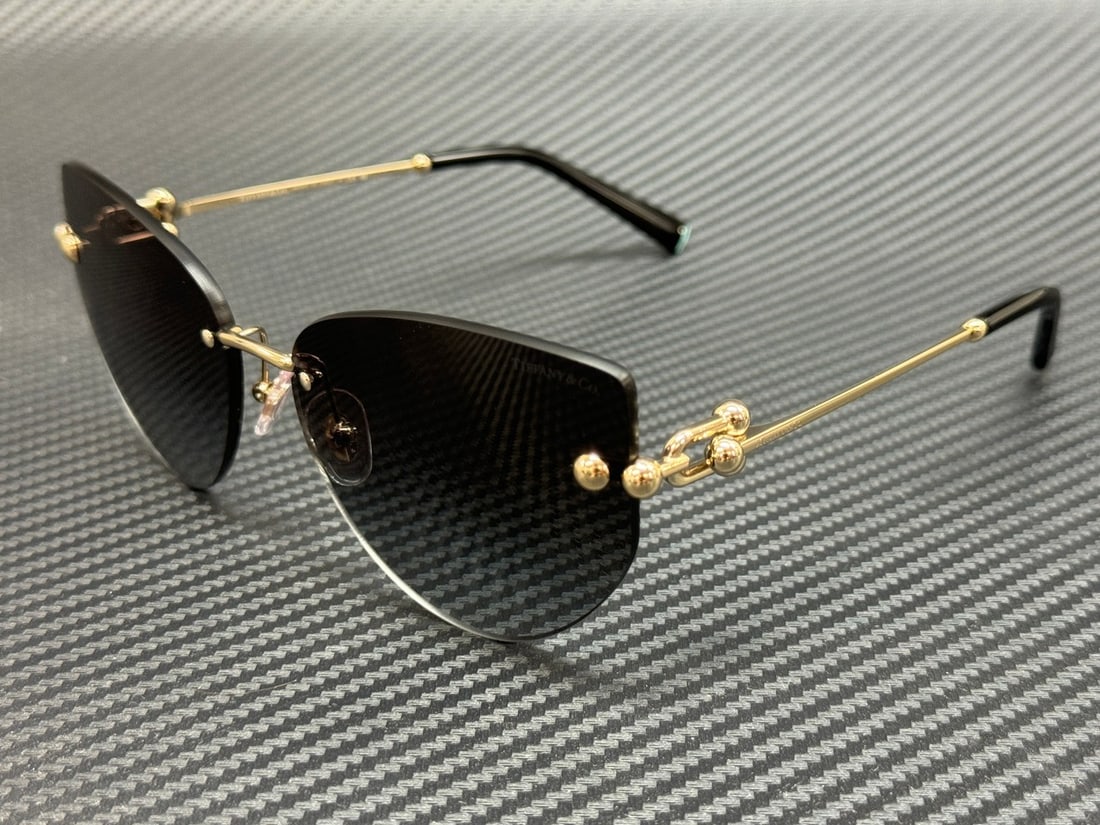 Tiffany TF3096 60213C Pale Gold Grey Gradient Women's Sunglasses: Tiffany TF3096 60213C Pale Gold Grey Gradient Women's Sunglasses Elevate your style with these Tiffany & Co. TF3096 60213C sunglasses. Featuring a sophisticated pale gold frame paired with chic grey g