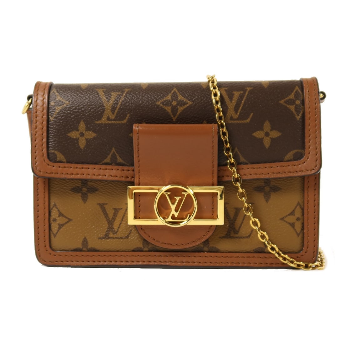 Louis Vuitton Dauphine Monogram Reverse Brown Chain Shoulder Bag M68746: Louis Vuitton Dauphine Monogram Reverse Brown Chain Shoulder Bag M68746 This Louis Vuitton Dauphine chain shoulder bag features the iconic Monogram Reverse design in brown PVC coated canvas. The bag i
