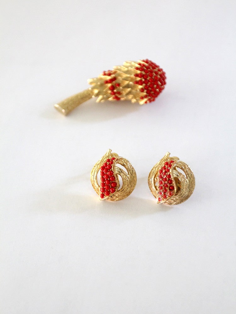 Celestial Vintage Brooch and Earring Set Gold Tone with Red Beads: Celestial Vintage Brooch and Earring Set Gold Tone with Red Beads This captivating vintage costume jewelry set features a unique brooch and matching earrings, perfect for adding a touch of celestial c