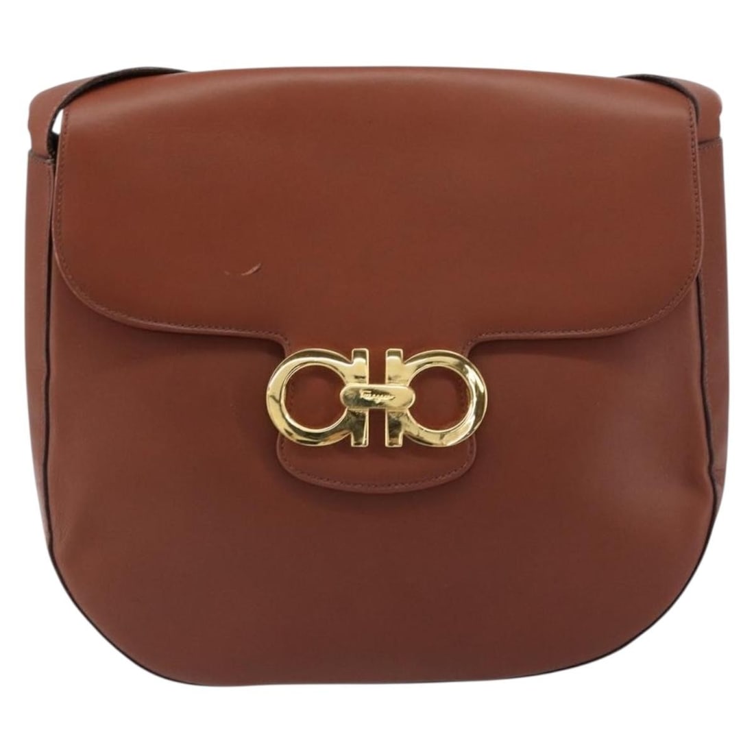 Gancini Leather Brown Shoulder Bag by Salvatore Ferragamo: Gancini Leather Brown Shoulder Bag by Salvatore Ferragamo This Salvatore Ferragamo Gancini shoulder bag is crafted from brown leather and designed for women. It features a spacious main compartment an