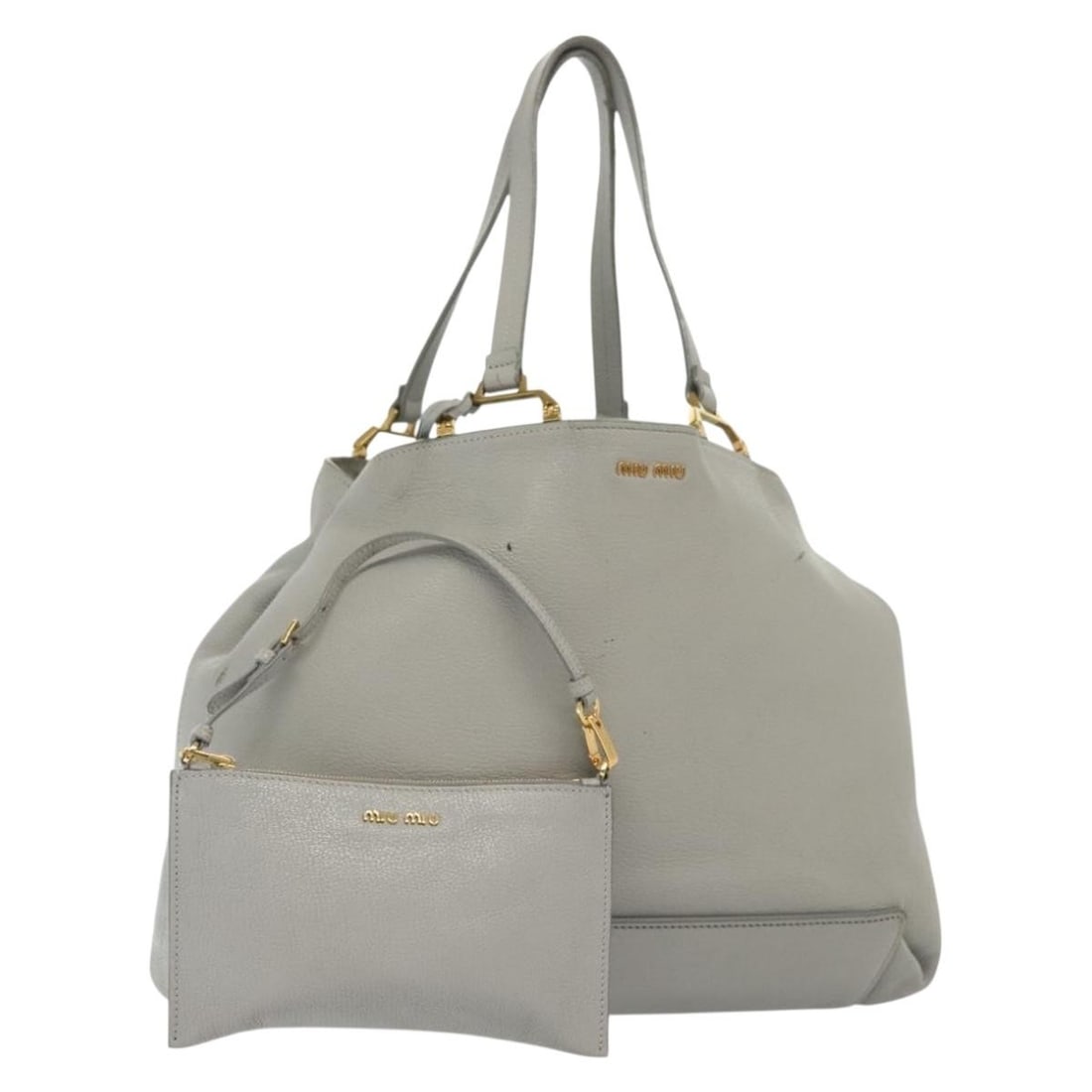 Miu Miu Gray Gold Leather Tote Bag Italy with Pouch: Miu Miu Gray Gold Leather Tote Bag Italy with Pouch This Miu Miu tote bag showcases a sophisticated combination of gray and gold leather. Crafted in Italy, this stylish tote features a spacious interi