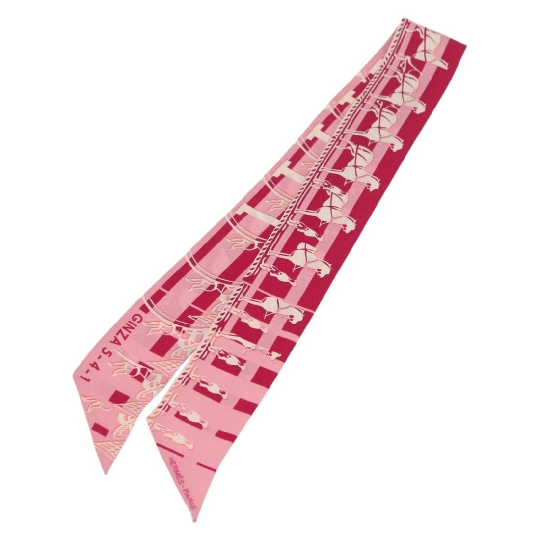 Silk Twilly Scarf Faubourg Seconde by Hermes in Red: Silk Twilly Scarf Faubourg Seconde by Hermes in Red This HERMES Twilly scarf from the "FAUBOURG SECONDE" collection is crafted from silk in a vibrant red color. The scarf is designed in a slim style a