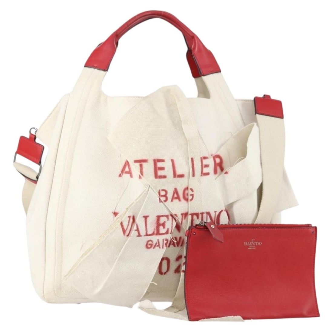 VALENTINO White Canvas 2-Way Tote Bag Italy Authentic: VALENTINO White Canvas 2-Way Tote Bag Italy Authentic This authentic VALENTINO tote bag is crafted from durable white canvas, making it a stylish yet practical accessory. Designed in Italy, it feature