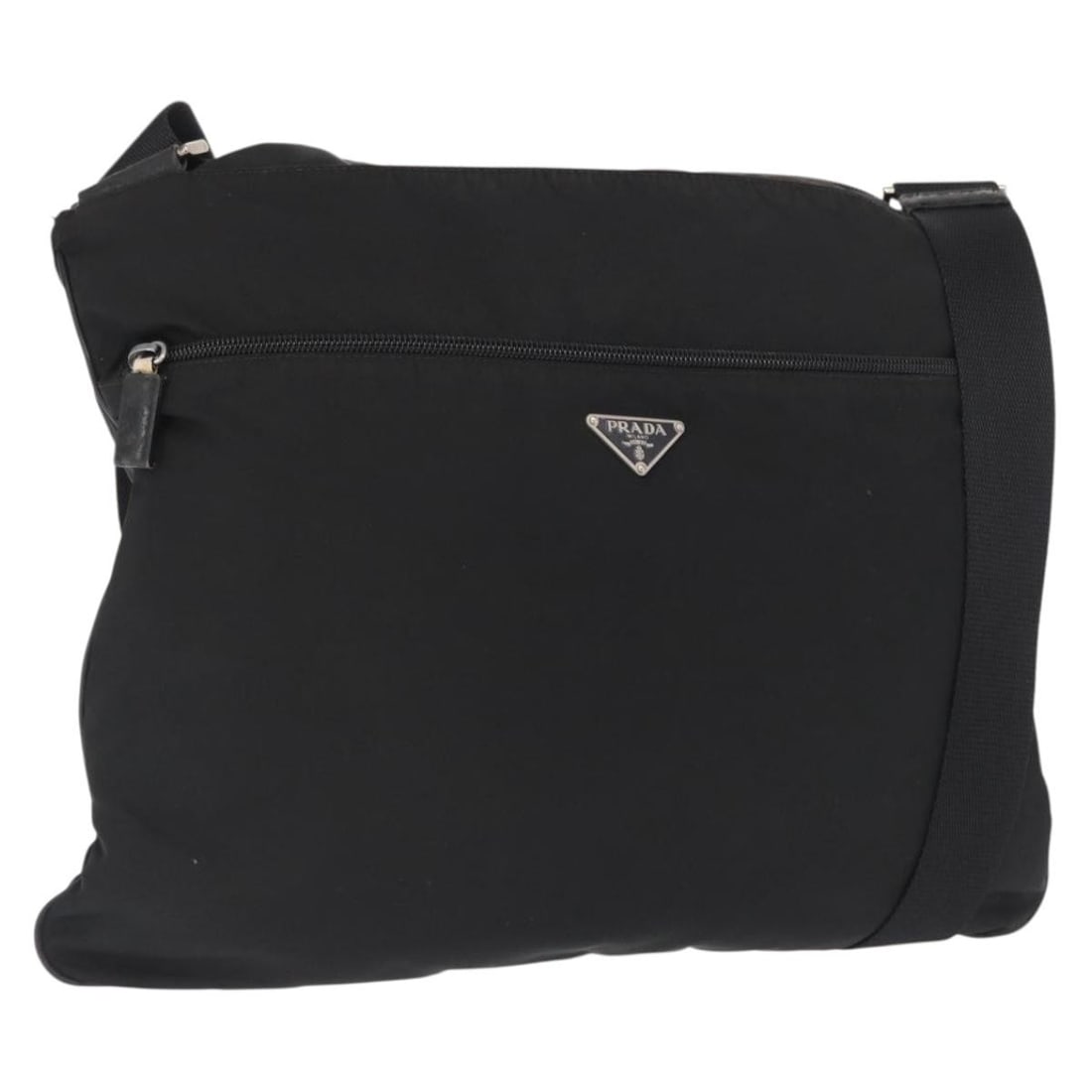 Prada Black Nylon Shoulder Bag with Silver Accents: Prada Black Nylon Shoulder Bag with Silver Accents This PRADA shoulder bag features a black and silver nylon exterior and is designed with an adjustable strap for versatile carrying options. Crafted i