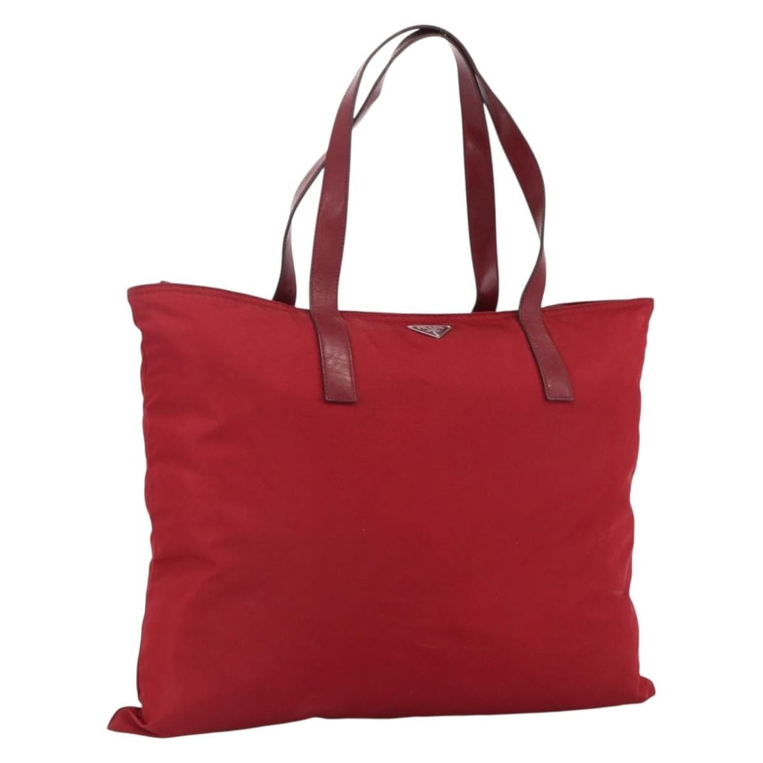 Red Nylon Tote with Silver Accents by Prada Italy: Red Nylon Tote with Silver Accents by Prada Italy This PRADA tote bag is crafted from red nylon with silver-tone accents. Designed for women, it features a spacious interior and dual top handles. Made