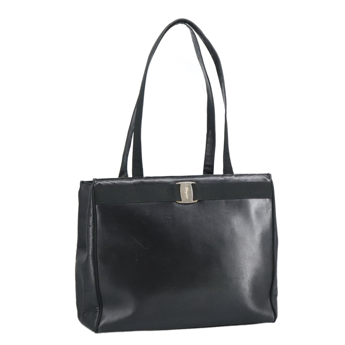 Black Leather Vala Tote by Salvatore Ferragamo Gold Hardware Italy: Black Leather Vala Tote by Salvatore Ferragamo Gold Hardware Italy This Salvatore Ferragamo Vala tote bag for women is crafted from black leather with gold-tone accents. Made in Italy, the bag feature