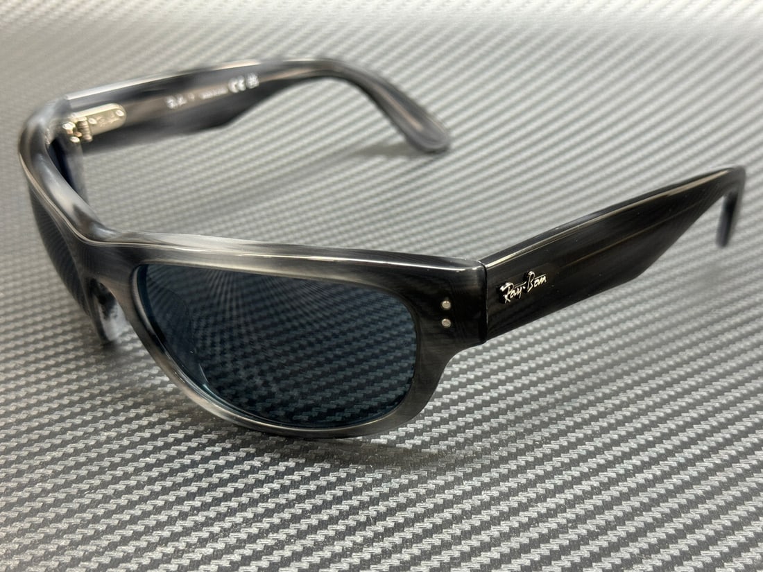 Ray-Ban RB2289 1404R5 Striped Grey Blue Sunglasses with Authenticity: Ray-Ban RB2289 1404R5 Striped Grey Blue Sunglasses with Authenticity Experience style and comfort with these Ray-Ban RB2289 1404R5 sunglasses, featuring a striking striped grey frame complemented by s