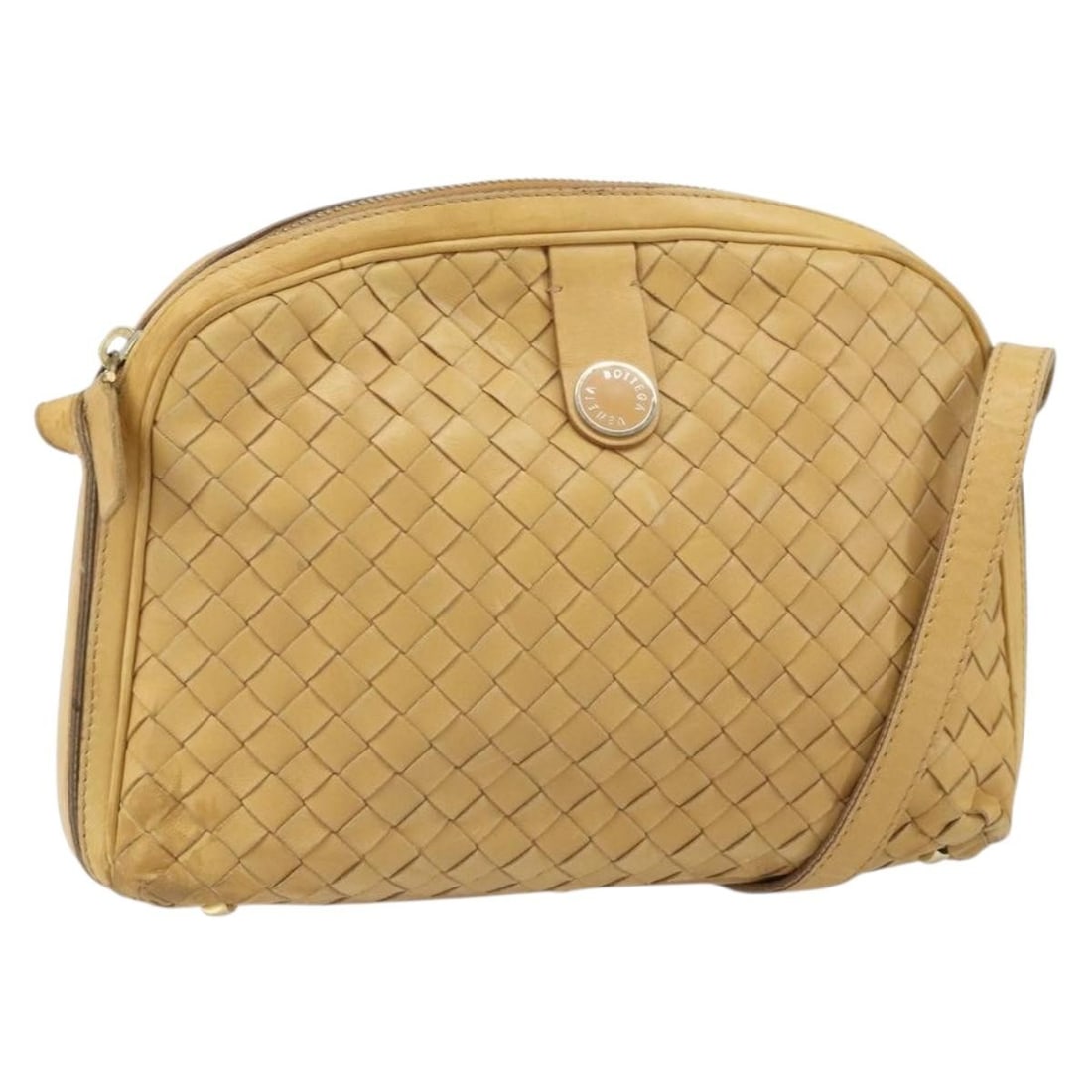 Beige Intrecciato Leather Shoulder Bag by Bottega Veneta Italy: Beige Intrecciato Leather Shoulder Bag by Bottega Veneta Italy This Bottega Veneta Intrecciato shoulder bag features a beige leather exterior with the brand's signature woven design. Made in Italy, th