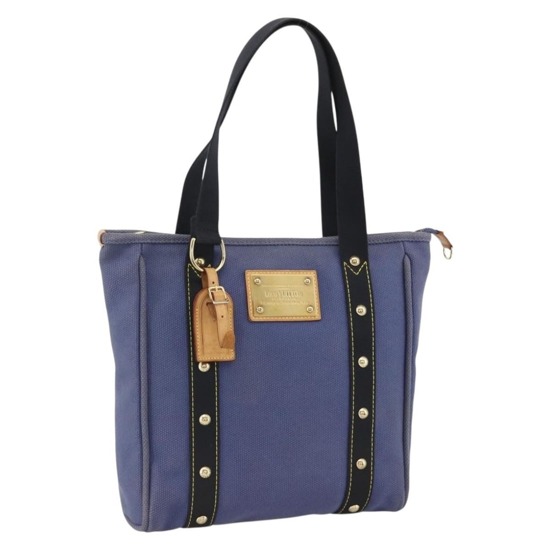 Louis Vuitton Antigua Cabas MM Blue Canvas Tote Bag M40087 With Name Tag: Louis Vuitton Antigua Cabas MM Blue Canvas Tote Bag M40087 With Name Tag This Louis Vuitton Antigua Cabas MM tote bag features a blue canvas exterior with a matching blue color scheme. Designed for wo