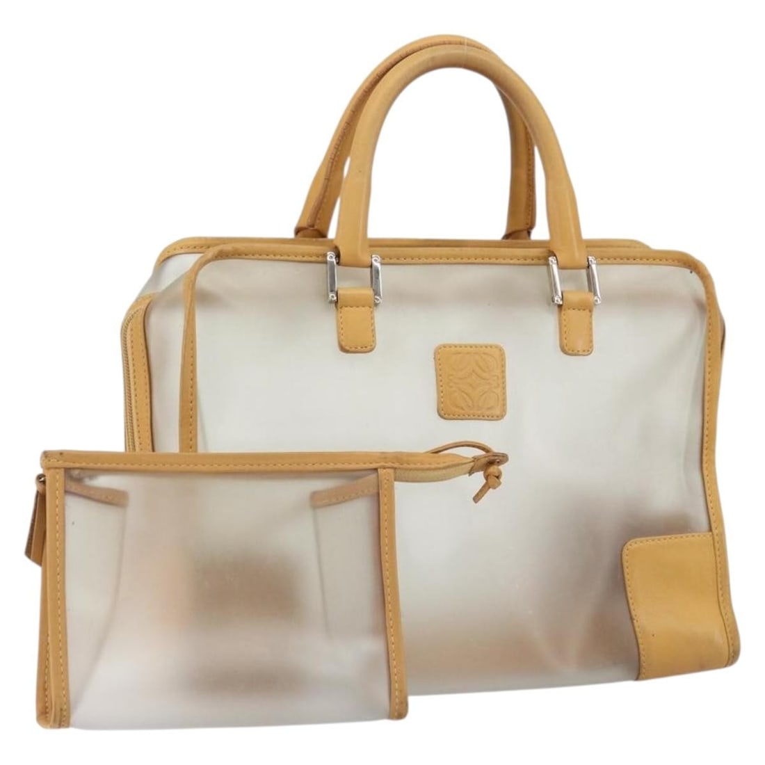 Loewe Amazona 30 Clear Vinyl Silver Limited Edition Handbag with Pouch: Loewe Amazona 30 Clear Vinyl Silver Limited Edition Handbag with Pouch This is a LOEWE Anagram Amazona 30 limited model handbag crafted from clear and silver vinyl. The bag features dual top handles a
