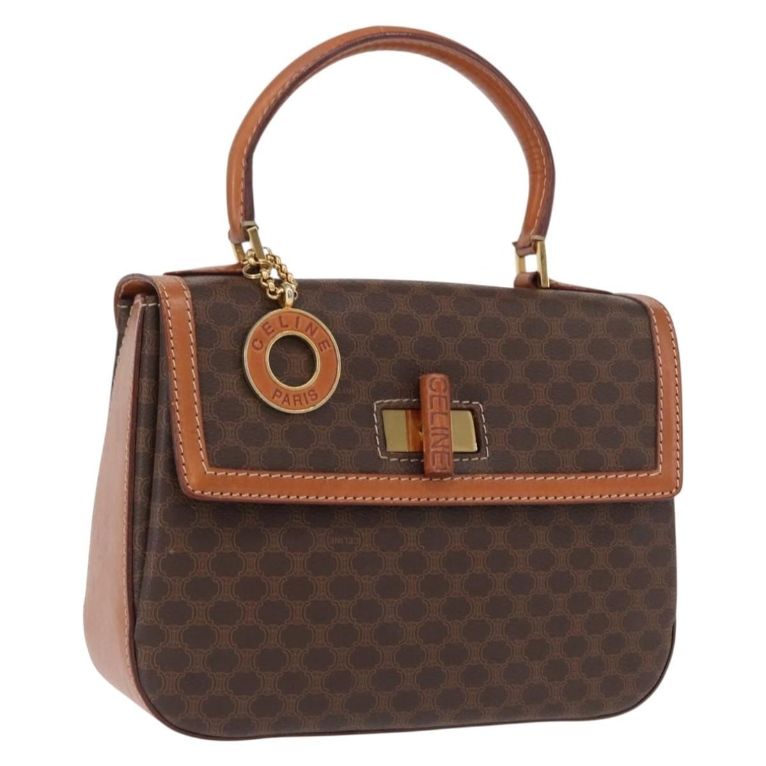 Celine Macadam Brown PVC Leather Handbag Gold Tone Accents Made in Italy: Celine Macadam Brown PVC Leather Handbag Gold Tone Accents Made in Italy This CELINE Macadam canvas hand bag features brown and gold PVC leather with a classic design. The bag is made in Italy and inc