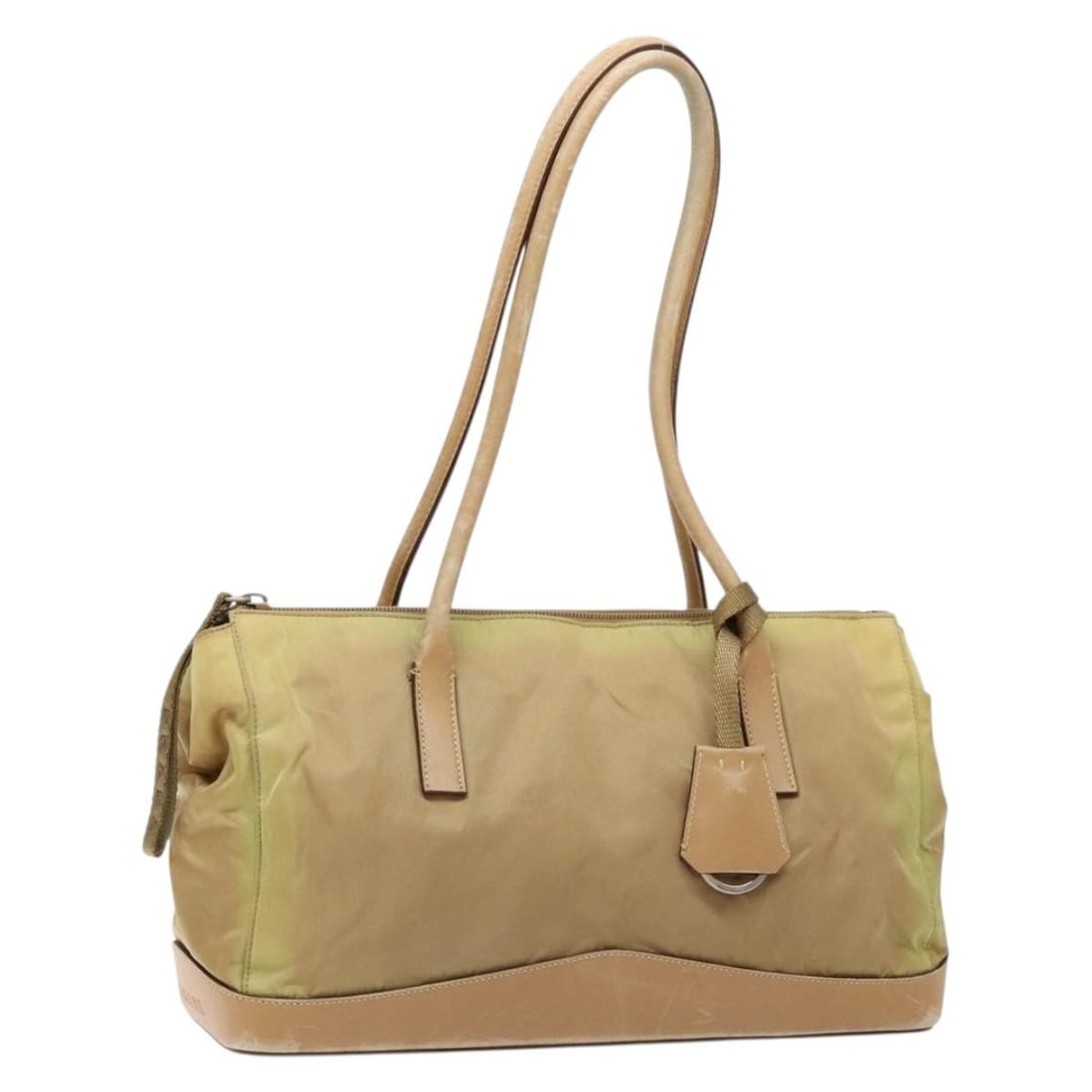 Authentic PRADA Beige Nylon Hand Bag Made in Italy: Authentic PRADA Beige Nylon Hand Bag Made in Italy This authentic PRADA handbag is crafted from durable nylon in a stylish beige color. Designed for practicality and elegance, it features a spacious i