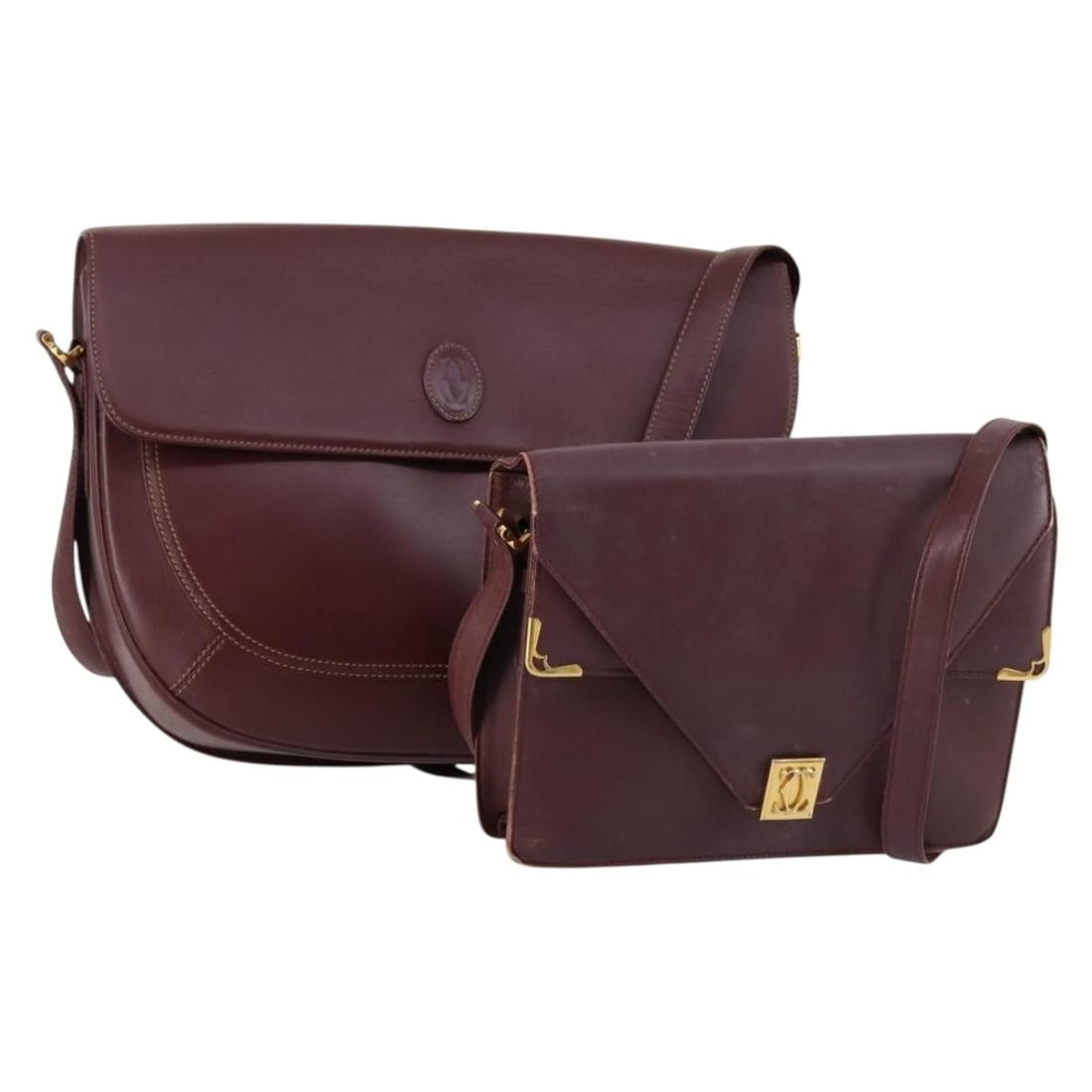 CARTIER Must Line Bordeaux Leather Shoulder Bag Set of 2 Authentic: CARTIER Must Line Bordeaux Leather Shoulder Bag Set of 2 Authentic This CARTIER Must Line Shoulder Bag in a rich Bordeaux leather is a stylish accessory that showcases the luxury craftsmanship synonym