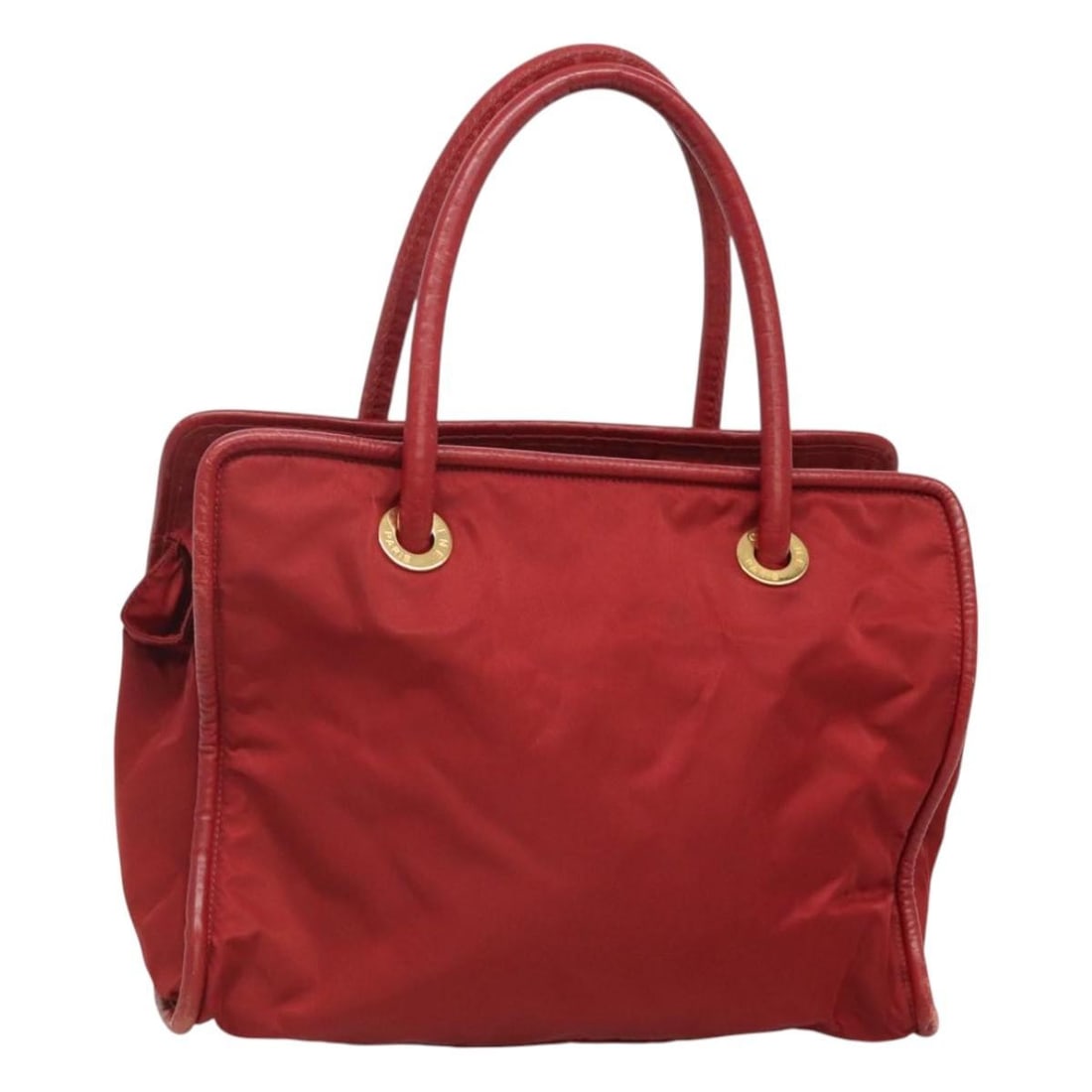 Red and Gold Nylon Handbag by CELINE Made in Italy: Red and Gold Nylon Handbag by CELINE Made in Italy This is a Celine women's handbag crafted from red nylon with gold-tone accents. The bag features dual handles, a spacious main compartment, and is ma