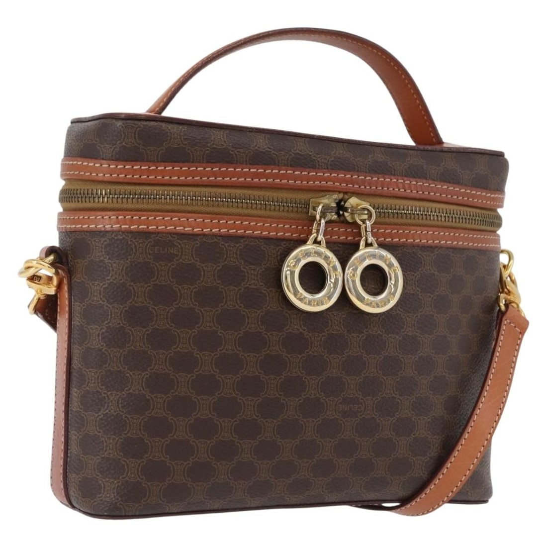 Celine Macadam Brown PVC Canvas Vanity Bag with Shoulder Strap: Celine Macadam Brown PVC Canvas Vanity Bag with Shoulder Strap This CELINE Macadam Canvas Circle Vanity Bag features signature PVC leather and Macadam canvas in a brown and gold colorway. Designed for