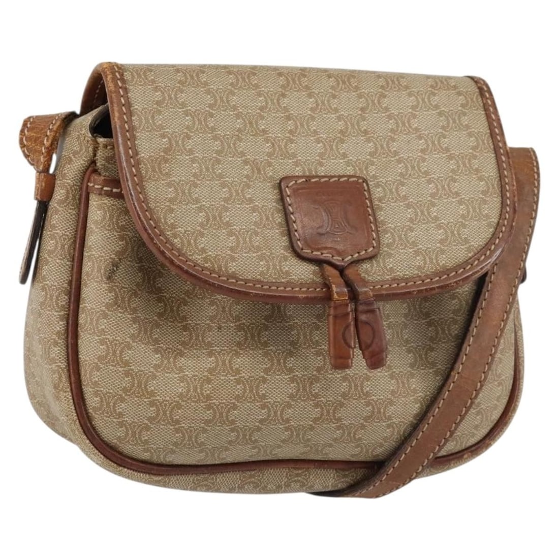 CELINE Macadam Canvas Beige Gold Shoulder Bag Made in Italy: CELINE Macadam Canvas Beige Gold Shoulder Bag Made in Italy This authentic CELINE Macadam Canvas Shoulder Bag is a stylish accessory crafted in Italy from durable PVC leather. Featuring a chic beige a