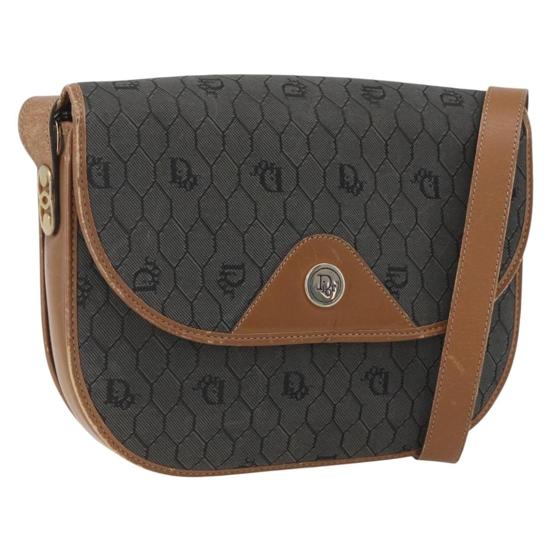 Christian Dior Gray Gold PVC Honeycomb Canvas Shoulder Bag: Christian Dior Gray Gold PVC Honeycomb Canvas Shoulder Bag This Christian Dior shoulder bag features a gray and gold honeycomb canvas exterior with PVC leather accents. Designed in France, it measures