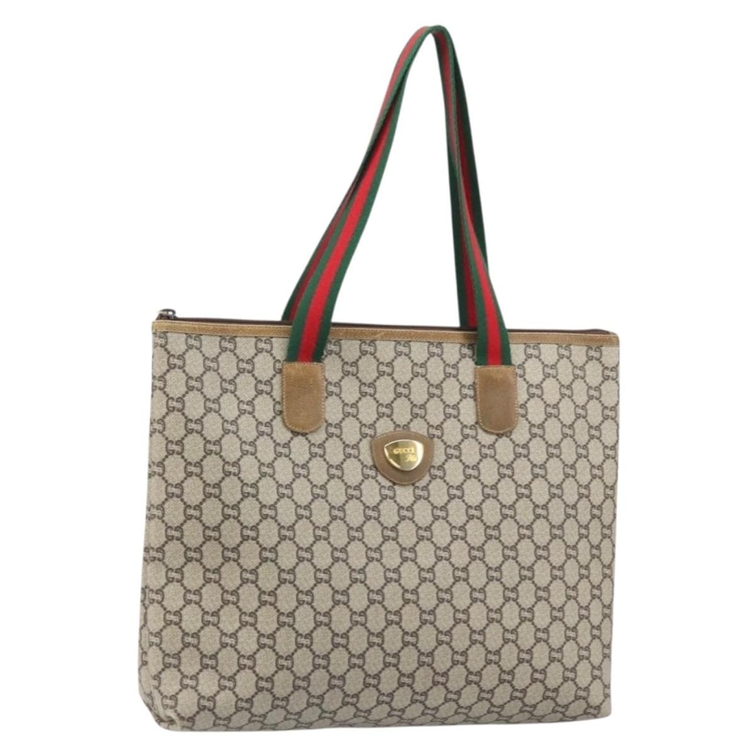 Beige GG Supreme PVC Tote Bag by Gucci Sherry Line: Beige GG Supreme PVC Tote Bag by Gucci Sherry Line This is a Gucci GG Plus Supreme Web Sherry Line tote bag crafted from PVC leather in beige and gold tones, featuring the signature GG canvas. The tot